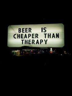 a sign that says beer is cheaper than therapy