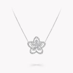 HIgh jewellery craftsmanship meets contemporary style in our Wild Flower necklace. Crafted with Graff's unmistakable eye for detail, layers of diamonds blossom in silhouette upon the pendant, with each sculptural petal individually rendered by hand. Updating the traditional English Garden with carefree charm and a contemporary spirit, four varieties of flower flourish in rare abundance in our Wild Flower garden, inspiring you to mix, match and make everyday diamonds your own. An expressive Wild Graff Diamond Necklace, Graff High Jewelry, Large Diamond Stud Earrings, Traditional English Garden, Triple Diamond Ring, Wild Flower Garden, Large Diamond Rings, Bangle Diamond, Flower Diamond Ring