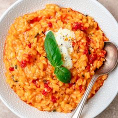 a white bowl filled with macaroni and cheese