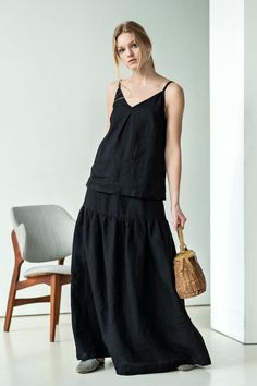 "This linen slip top is light, breathable and super crisp - a must-have of the warm season. A little pleat in front gives this camisole a character while simplicity of its silhouette allows endless pairing options. It goes well with skirts, pants, shorts, flats, heels, espadrilles and for any occasion. The garment is double washed to ensure a soft and comfortable feel and no shrinkage. ABOUT US LINEN ID was born from desire to embrace things that actually matter. We aim to create sustainable gar Casual Linen Camisole For Day Out, Chic Linen Camisole For Day Out, Sleeveless Linen Camisole For Vacation, Linen Camisole For Summer Day Out, Linen Camisole For Day Out, Chic Linen Tank Top With Adjustable Straps, Sleeveless Linen Camisole For Summer, Sleeveless Linen Camisole For Beach, Linen Tank Top For Vacation