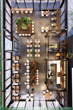 an overhead view of a restaurant with many tables and chairs in the middle of it