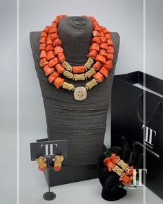 Description Our stunning Coral Bead Necklace and African pendant set are a perfect choice for anyone searching for a unique and eye-catching piece of jewellery. This ethnic necklace is ideal for fashion-forward individuals, who want to add a touch of elegance to their ensemble. Crafted from high-quality coral beads, this African beaded necklace features an intricate design that is a perfect reflection of the rich African cultures and traditions. With this fabulous necklace, you're sure to stand Elegant Orange Red Coral Beads, Elegant Coral Necklaces With Large Beads, Elegant Coral Beaded Necklaces With Large Beads, Coral Jewelry With Large Beads, Elegant Large Coral Beads, Elegant Red Coral Gemstone Beads, Elegant Coral Large Beads, Traditional Red Coral Beaded Necklaces For Wedding, Elegant Coral Gemstone Beaded Necklaces