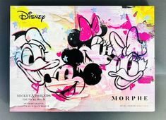 a piece of paper with mickey and minnie mouses on it