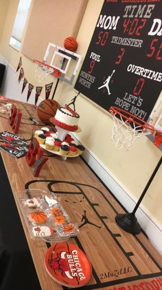 a basketball themed birthday party with cupcakes and decorations