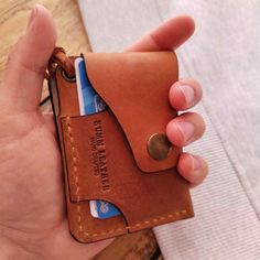 Wrap wallet with three pockets for 7 cards and folded cash. This leather wallet has a unique design and serves for many years to come FEATURES Size : 105 x 75 mm. 7 card + cash capacity Handmade and Hand stitched Quality Genuine Leather Handmade Brown Card Holder For Everyday Use, Handmade Brown Rectangular Card Holder, Brown Hand-stitched Card Holder For Gift, Brown Hand-stitched Card Holder Gift, Handmade Brown Wallet For Daily Use, Handmade Brown Trifold Wallet, Handmade Vintage Brown Card Holder, Vintage Handmade Brown Trifold Wallet, Vintage Brown Handmade Trifold Wallet