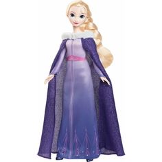 a frozen princess doll with long blonde hair and blue dress, standing in front of a white background