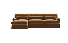 a brown couch sitting on top of a white floor