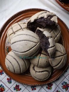 a plate full of cookies on top of a table