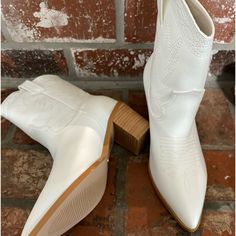 Rock This Seasons Hottest Bootie! These Go Great With Jeans, Daisy Dukes Or That Darling Denim Skirt! See Pic For All The Details White Closed Toe Boots Medium Width, White Medium Width Closed Toe Boots, White Ankle-high Summer Boots, White Medium Width Boots For Spring, White Fitted Boots With Flat Heel, Fitted White Boots With Flat Heel, Casual White Boots With Low Heel, Casual White Low Heel Boots, White Low Heel Summer Boots