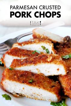 pork chops on a white plate with parmesan crust