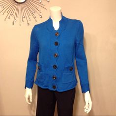 "Fancy" Has A Zigzag Knit Front Neckline And Opening With Eclectic Buttons Closure. Two Front Pockets With Button Accent, Zigzag Cuff. Length From Shoulder Is 21". Fabric Content 100% Cotton. Nwt. Elegant Blue Knit Cardigan, Blue Cardigan With Buttons For Spring, Blue Button Cardigan For Spring, Blue Knit Button-up Sweater, Blue Cardigan For Spring, Chic Blue Knit Outerwear, Fitted Blue Cardigan For Fall, Trendy Blue Cardigan With Buttons, Fall Textured Knit Blue Cardigan