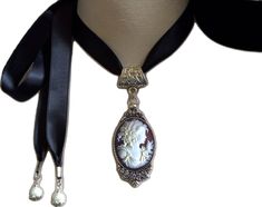 Classic Cameo Necklace With Oval Pendant, Elegant Cameo Jewelry For Formal Occasions, Victorian Style Adjustable Choker For Formal Occasions, Victorian Adjustable Choker For Formal Occasions, Vintage Silver Choker As Gift, Vintage Silver Choker For Gift, Adjustable Victorian Choker For Formal Occasions, Victorian Cameo Pendant Necklace, Victorian Choker Necklace For Formal Occasions