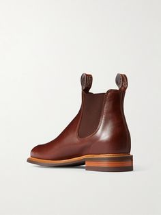 Nearly a century of leather craft expertise informs R.M Williams' footwear. In a rich chestnut-brown shade, these 'Urban Turnout' Chelsea boots are fitted with elasticated side panels and logo-embroidered pull tabs for easy on and off. The stacked rubber soles provide exceptional traction. Lower Impact Materials. This product is made using at least 50% lower-impact materials or ingredients. Find out more about our Consciously Crafted criteria here. Rm Williams, Brown Chelsea Boots, Brown Shade, Chelsea Boots Men, Boots Uk, Brown Shades, Chestnut Brown, Leather Chelsea Boots, Mr Porter