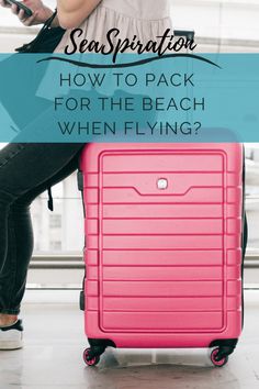 a woman sitting on top of a pink suitcase with text overlay that reads, how to pack for the beach when flying?