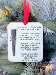 a christmas ornament hanging from a tree with a poem written in the middle