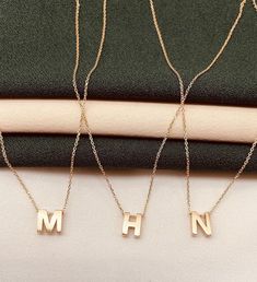 Discover the elegance of our 14k gold letter necklace, a perfect blend of sophistication and personalization. This dainty custom initial pendant is an ideal gift for any occasion, from birthdays to anniversaries, offering a timeless piece of jewelry that she will cherish forever. ✨ High-Quality 14k Gold: Made with genuine 14k gold for a luxurious and lasting shine. 🎁 Personalized Initial: Customizable with any letter of your choice to create a meaningful keepsake. 💎 Elegant Design: Features a Classic Formal Name Necklace With Initials, Minimalist Initial Pendant Name Necklace In White Gold, Elegant Gold Initial Necklace With Name Detail, Dainty 14k Gold Monogram Name Necklace, Minimalist Monogram Initial Necklace In White Gold, Minimalist White Gold Initial Pendant Necklace, Rose Gold Initial Pendant Necklace, Elegant 14k Gold Initial Necklace For Anniversary, Formal Yellow Gold Name Necklace With Initial Pendant