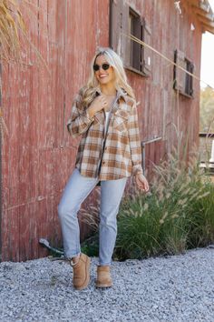 This Brown Plaid Hooded Shacket is a cozy layer that combines the best of a shirt and jacket! This versatile piece features buttoned cuffs, a classic collared neckline, and an attached hood for added warmth. The zip-up front closure is paired with a button-down front for a unique look, while the flap chest pockets add a touch of functionality. Crafted with a timeless allover plaid pattern and contrast detailing, this shacket is perfect for adding a rustic-chic vibe to your fall wardrobe! Everyday Collared Tops For Fall, Collared Cotton Shacket For Fall, Collared Tops With Buttoned Pockets For Winter, Fall Tops With Buttoned Pockets For Everyday, Fall Long Sleeve Tops With Buttoned Pockets, Long Sleeve Tops With Buttoned Pockets For Fall, Winter Lapel Collar Top For Everyday, Fall Long Sleeve Shacket With Buttoned Pockets, Long Sleeve Shacket With Buttoned Pockets For Fall