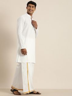 VASTRAMAY Men's White Cotton Kurta And Mundu Set Look dapper in this ethnic set featuring a comfortable cotton kurta and mundu. Perfect for festive occasions and ceremonies. Key Features Cotton kurta and mundu set Comfortable and breathable fabric Perfect for festive occasions and ceremonies Specifications Sleeve Length - Full Sleeves Top Shape - Straight Top Hemline - Straight Top Length - Above knee length Neck Mandarin Collar Print or Pattern Type - Solid Material & Care Kurta Fabric: Cotton Bottom Fabric: Pure Cotton Dry-clean Legal Disclaimer: The product is guaranteed to be 100% genuine. Product images are for illustrative purposes only. Images/packaging/ labels may vary from time to time due to changes made by the manufacturer's manufacturing batch and location. The product descript Cotton Sherwani With Traditional Patterns, Cotton Straight Kurta For Wedding, Ceremonial Cotton Sherwani With Cutdana, Cotton Sherwani With Dabka Detailing For Puja, Cotton Sherwani With Dabka For Puja, Cotton Bandhgala For Eid Ceremonial, Cotton Bandhgala For Eid Ceremonies, Ceremonial Cotton Bandhgala For Eid, Ceremonial Cotton Kurta With Chikankari Embroidery