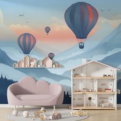 a living room scene with hot air balloons in the sky and a doll house on the floor