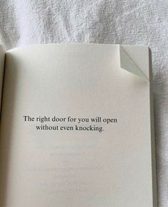 an open book with the words, the right door for you will open without even knocking