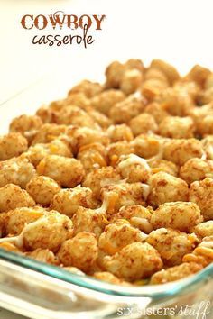 a casserole dish filled with cauliflower and topped with crumbs