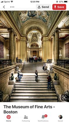 people are sitting on the stairs in an ornate building