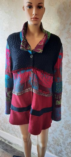 "Vintage multi coloured jacket made of various fabrics.  Five buttons to close, knitted sleeves, middle panel and collar, the black  top section is stretchy and the bottom section is wool. It has velvet ribbons as trimming. Bust;  42\" Length;  33\" Inside arm;  19\"      Made by Oliver Philips" Boho Collar Long Sleeve Outerwear For Fall, Long Sleeve Outerwear With Boho Collar For Fall, Fall Outerwear With Boho Collar And Long Sleeves, Fall Boho Collar Long Sleeve Outerwear, Multicolor Bohemian Outerwear With Buttons, Bohemian Multicolor Outerwear With Buttons, Bohemian Black Outerwear With Patchwork, Festival Long Sleeve Patchwork Cardigan, Black Bohemian Patchwork Outerwear