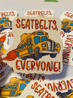 several school bus magnets with the words seatbelts everyone left behind