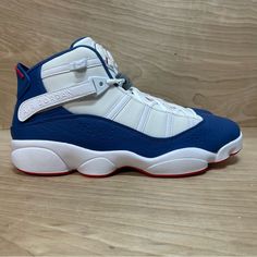 Jordan 6 Rings 'True Blue' Sneakers Size 12.5 Mens White Red Blue Blue Custom Sneakers With Contrast Sole For Light Sports, Blue Basketball Shoes With Contrast Sole For Casual Use, Blue Leather Custom Sneakers For Light Sports, Blue Leather Basketball Shoes, Blue Leather High-top Sneakers For Light Sports, Blue Running Sneakers With Contrast Sole, Blue Sneakers With Contrast Sole For Running, Navy Custom Sneakers For Sports, Blue Jordan Shoes With Rubber Sole For Sports