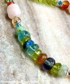 I was inspired by the ever colorful Red Eyed Tree Frog. This necklace features multiple gemstones ~🔹3 AAA Ethiopian Opals🔹Chrysocolla🔹Fluorite🔹Orange Adventurine🔹Carnelian 🔹Black Spinel🔹Peridot🔹Chrome Diopside 🔹Blue Apatite🔹.925 Sterling Silver Clasp and bead toppers. 🔶All gemstones are high quality and completely natural. 20” Length Red Eyed Tree Frog, Kyanite Earrings, Frog Necklace, Tree Frog, Blue Apatite, Black Spinel, Labradorite Pendant, Opal Earrings, Circle Pendant