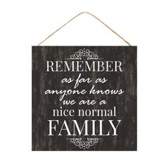 a wooden sign that says, remember as for us anyone knows we are a nice normal family