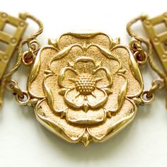 'Rose' link from the Tudor Chain of Office. England, 15-16th cent. Width 47 mm, height 44 mm. Brass cast. Medieval Historical Design Gold Jewelry, Medieval Style Gold Jewelry With Antique Finish, Medieval Brass Jewelry With Antique Finish, Medieval Metal Jewelry With Antique Finish, Medieval Style Metal Jewelry With Antique Finish, Medieval Gold Bracelet Jewelry, Medieval Bronze Jewelry With Antique Finish, Medieval Style Bronze Jewelry With Antique Finish, Medieval Style Gold Bracelet