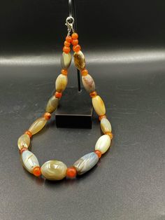 The Rare and Unique Mala Necklace of Indo Tibetan Sulumnai Agate Beads The age of this beads are more than 1000 years old it was used as Amulet Beads and used as prayers Beads in prayer malas Fast and free shipping service Enjoy Traditional Oval Agate Beads, Gems, And Cabochons, Traditional Oval Agate Beads Gems And Cabochons, Hand-strung Oval Agate Beads, Large Spiritual Agate Beads, Gems, And Cabochons, Oval Agate Beads For Gemstone Cabochons, Oval Agate Beaded Necklaces, Amber Agate Beads With Natural Stones, Large Amber Agate Beads, Amber Polished Agate Beads