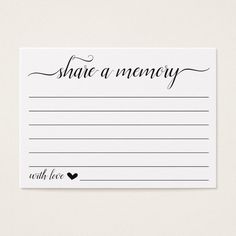 a white postcard with black ink that says, share a memory and heart on it