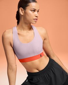 A racerback sports bra designed for short runs and yoga sessions. Providing light support for laid-back days. The Pace Bra is designed to look good and feel even better, featuring a racerback silhouette with light support and no extra padding. Seamlessly taking you from run club to coffee in a laid-back style, wear it on its own or with a layer on top. Why not pair it with the Pace Tank? Made with innovative CleanCloud® polyester, for a material so soft and easy-to-wear that your body will thank Light Support Racerback Sports Bra In Recycled Polyester, Recycled Polyester Light Support Racerback Sports Bra, Recycled Polyester Racerback Sports Bra, Recycled Polyester Sports Bra, Sporty Racerback Sports Bra In Recycled Polyester, Sporty Recycled Polyester Racerback Sports Bra, Seamless Sports Bra In Recycled Polyester, Running 10k, Tempo Run