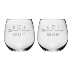 two personalized wine glasses with arrows and hearts on the bottom, set of 2