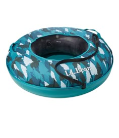 the inflatable tube is blue and black with white designs on it, as well as an inner tube