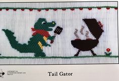 a cross stitch pattern with an image of a dinosaur and a bbq grill on it