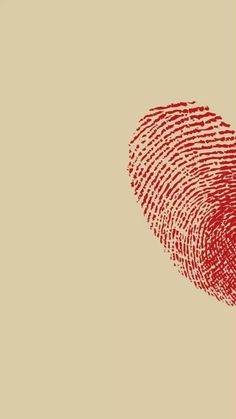 a red fingerprint on a beige background that looks like it has been placed in the shape of a heart