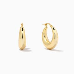 Standout in a sea of gold hoops with our Rare Hoop Earrings. These unique hoops will bring some shape and dimension to your ear stack. Wear them front and center of your stack and style with a simple earring, or be bold and layer with our marbled pink Tube Hoop Earrings.