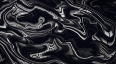 an abstract black and white background with wavy lines