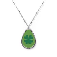 Four Leaf Clover Shamrock Oval Pendant Necklace! This unique and charming necklace is the perfect accessory to showcase your love for luck and Irish symbolism. Crafted with an oval pendant, featuring a beautiful  four leaf clover shamrock, this necklace is a true symbol of good fortune. The pendant hangs elegantly from a dainty chain, adding a touch of sophistication to any outfit. Whether it's for a special occasion or simply to add a touch of Irish charm to your everyday look, this necklace is Everyday Oval Pendant Necklace With Charms, Oval Charm Necklaces As Gift, Oval Charm Necklaces For Gifts, Green Oval Pendant Necklace With Engraving, Green Oval Pendant Necklace Engraved, Oval Charms Necklace For Gift, Personalized Oval Sterling Silver Charm Necklaces, Nickel-free Oval Pendant Necklace For Anniversary, Personalized Oval Sterling Silver Charm Necklace