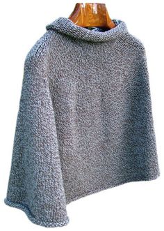 a gray sweater is hanging on a wooden hanger