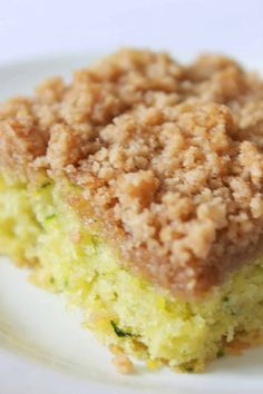 a close up of a piece of cake on a plate with food crumbs