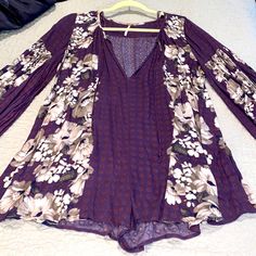 Nwot Fp Floral Purple Romper, Beautiful Colors. Oversized Fit. Length From Top Shoulder To Bottom Hem Is Approx 31 Inches. Chest & Waist Are Approx 25 Inches Across. Sleeve Length Is Approx 24 Inches. Inseam Is 2 Inches. Feel Free To Ask Questions, All Offers Welcome! Purple Romper, Free People Pants, Floral Romper, Purple Floral, Oversized Fits, Beautiful Colors, Pant Jumpsuit, Jumpsuit Romper, Free People