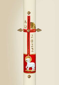 a red and white pole with an animal on it's side, in the shape of a cross