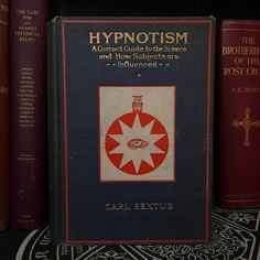 an old book with red and blue covers