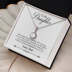 Surprise your beloved daughter with a timeless and elegant gift – our dazzling "To My Daughter, Love Dad" Eternal Hope Necklace. This exquisite piece features a cushion-cut center cubic zirconia that sparkles with every step, ensuring a stunning and radiant look on every occasion. Crafted with precision, the pendant boasts a 14k white gold finish over stainless steel, enhancing its durability and adding a touch of sophistication. The 8mm cushion-cut center cubic zirconia crystal takes center sta Wedding Jewelry Gift For Father's Day, Mother's Day Wedding Jewelry In Gift Box, Father's Day Silver Jewelry Gift Box, Wedding Jewelry Gift Box For Mother's Day, Silver Jewelry With Gift Box For Father's Day, Personalized Cubic Zirconia Necklace For Mom, Father's Day Jewelry Gift With Box, White Jewelry Gift For Father's Day, Sterling Silver Jewelry In Gift Box For Mother's Day