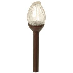 a wooden pole with a glass light on it's end and a white background