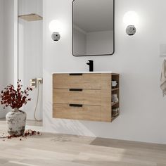 a bathroom with a sink, mirror and towel rack on the wall next to it